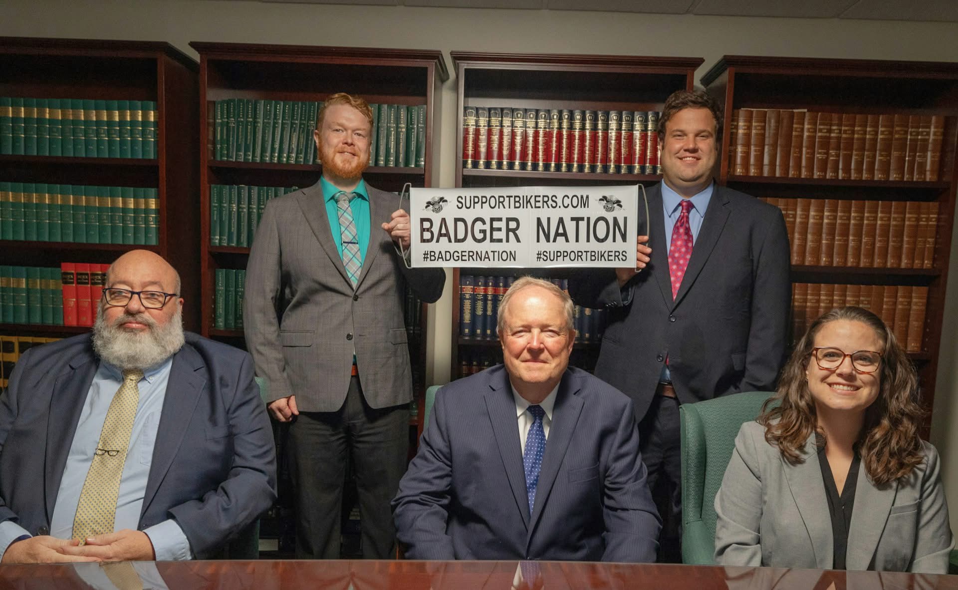O'Connor Law holding Badger Nation Banner - Pennsylvania Motorcycle Accident Attorneys