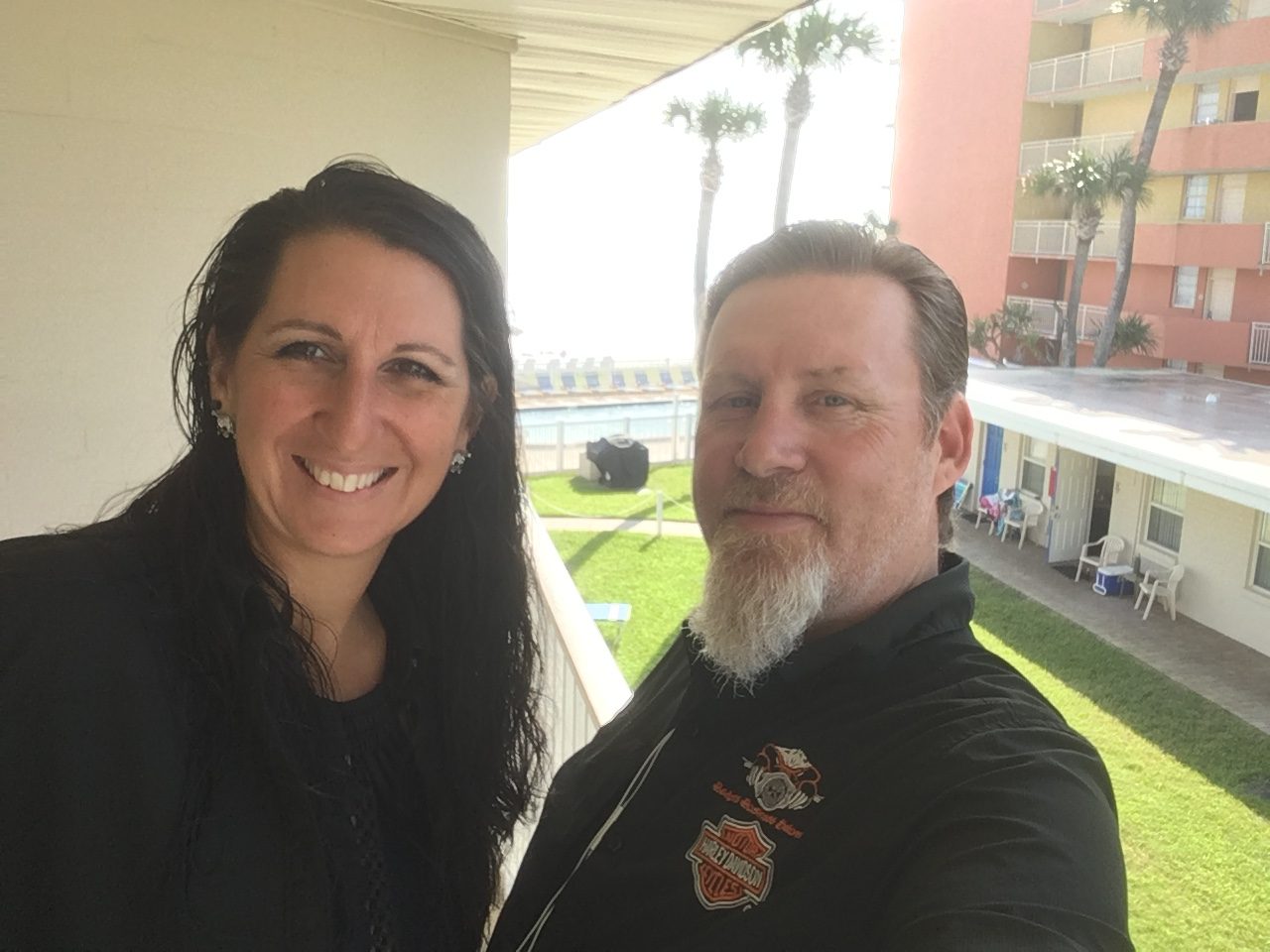 Motorcycle Riders Sonny and Angie Badger outside a retro-style motel - Daytona Beach hotels Motorcycle Riders Sonny and Angie Badger outside a retro-style motel - Daytona Beach hotels