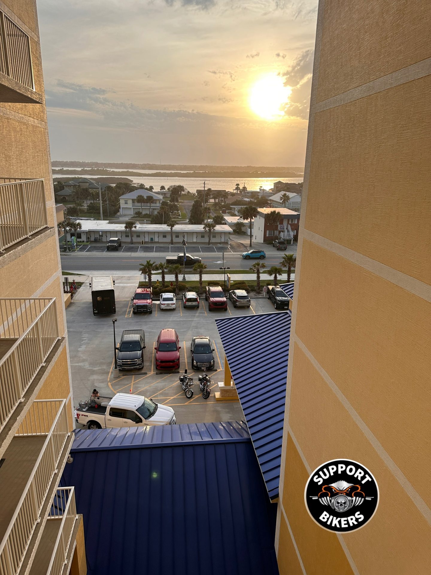A well-known Daytona Beach hotel exterior with an American cruiser motorcycle in the foreground - Daytona Beach hotels A well-known Daytona Beach hotel exterior with an American cruiser motorcycle in the foreground - Daytona Beach hotels