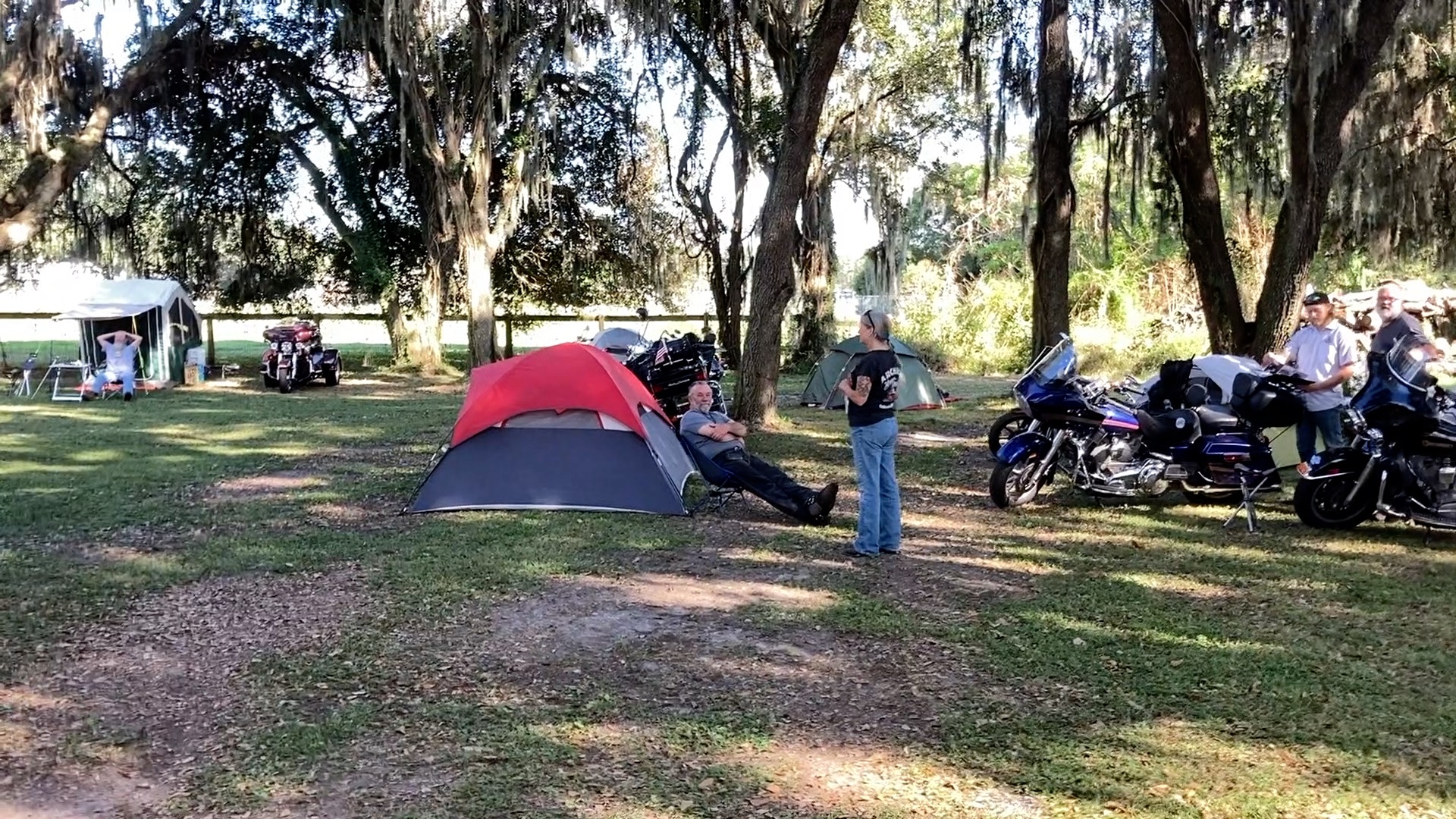 campground of cruisers under starry sky - motorcycle club event ideas