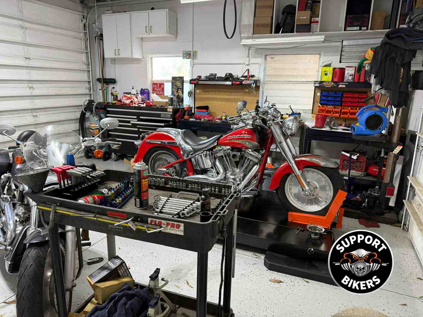 motorcycle tools on workbench - motorcycle maintenance 101
